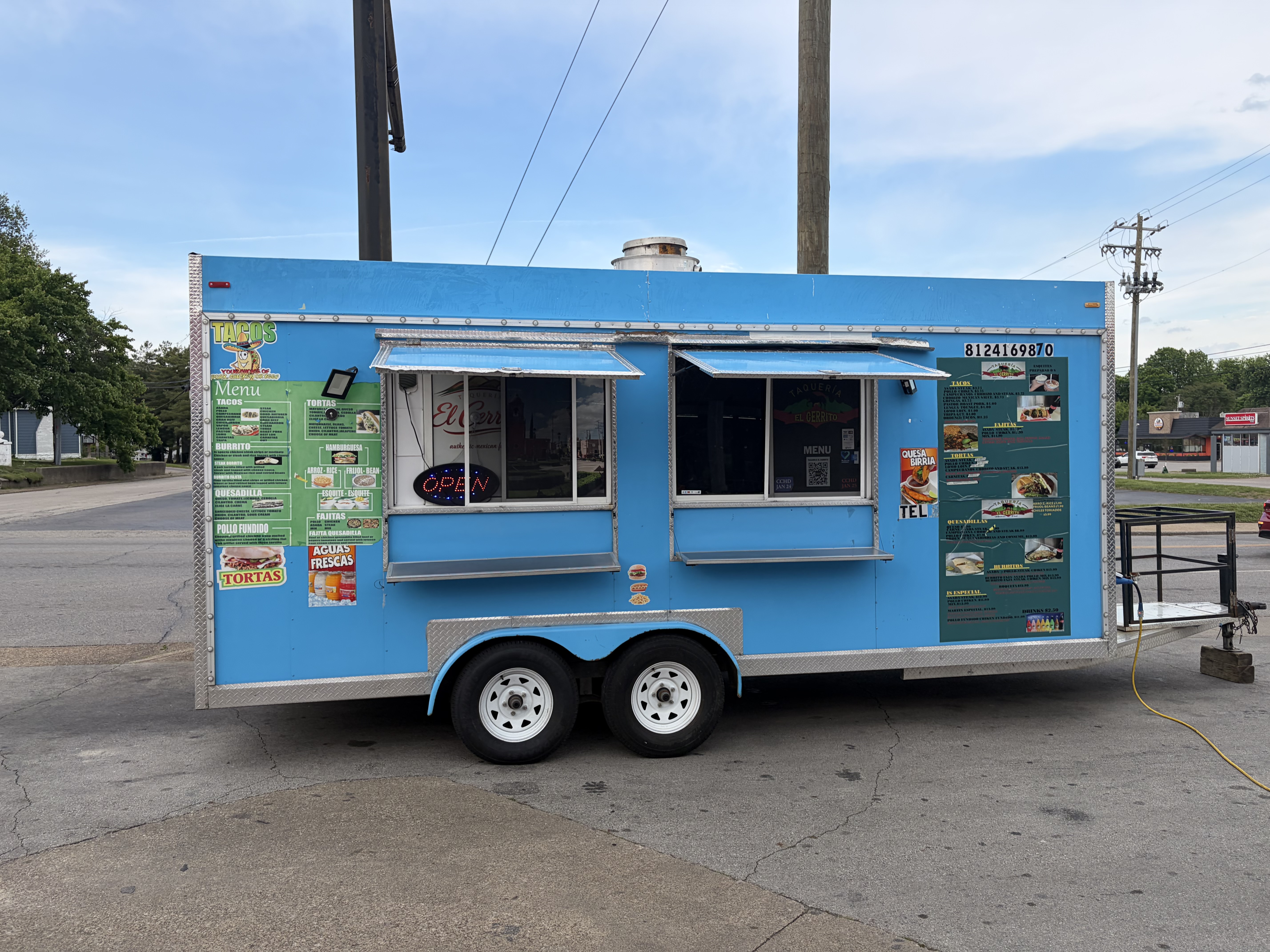The light-blue Taqueria El Cerrito food truck on E Spring Street